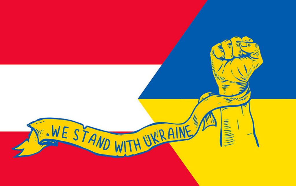 Прапори України та Австрії.