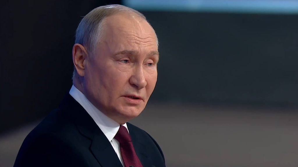 Путін.