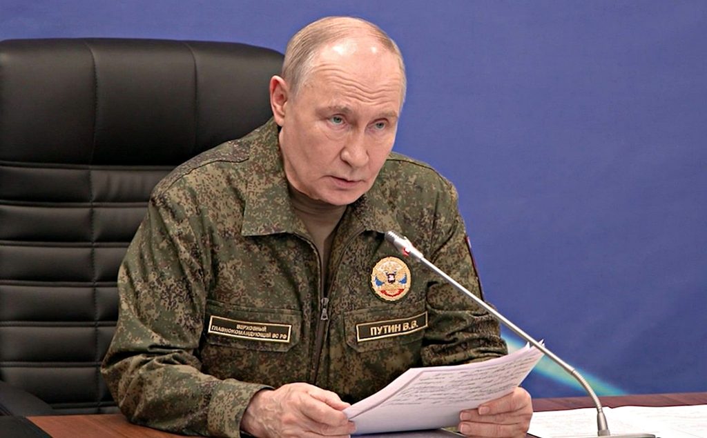Путін.