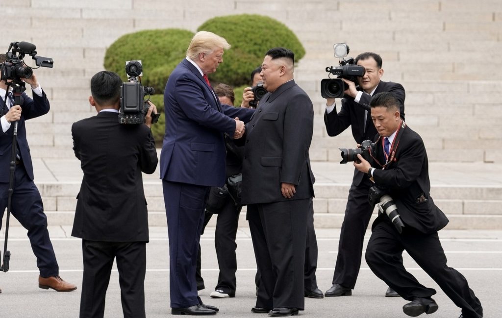 Дональд Трамп та Кім Чен Ин.